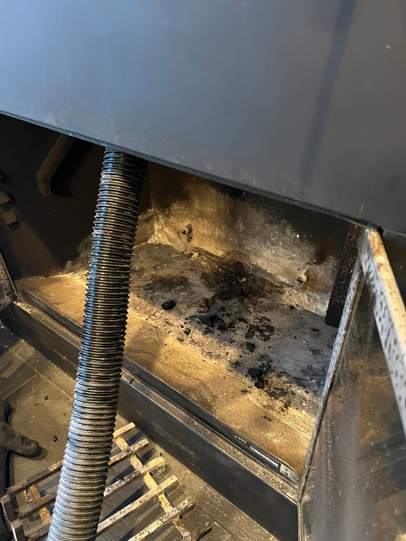 Measurement and inspection work on a hearth assembly.